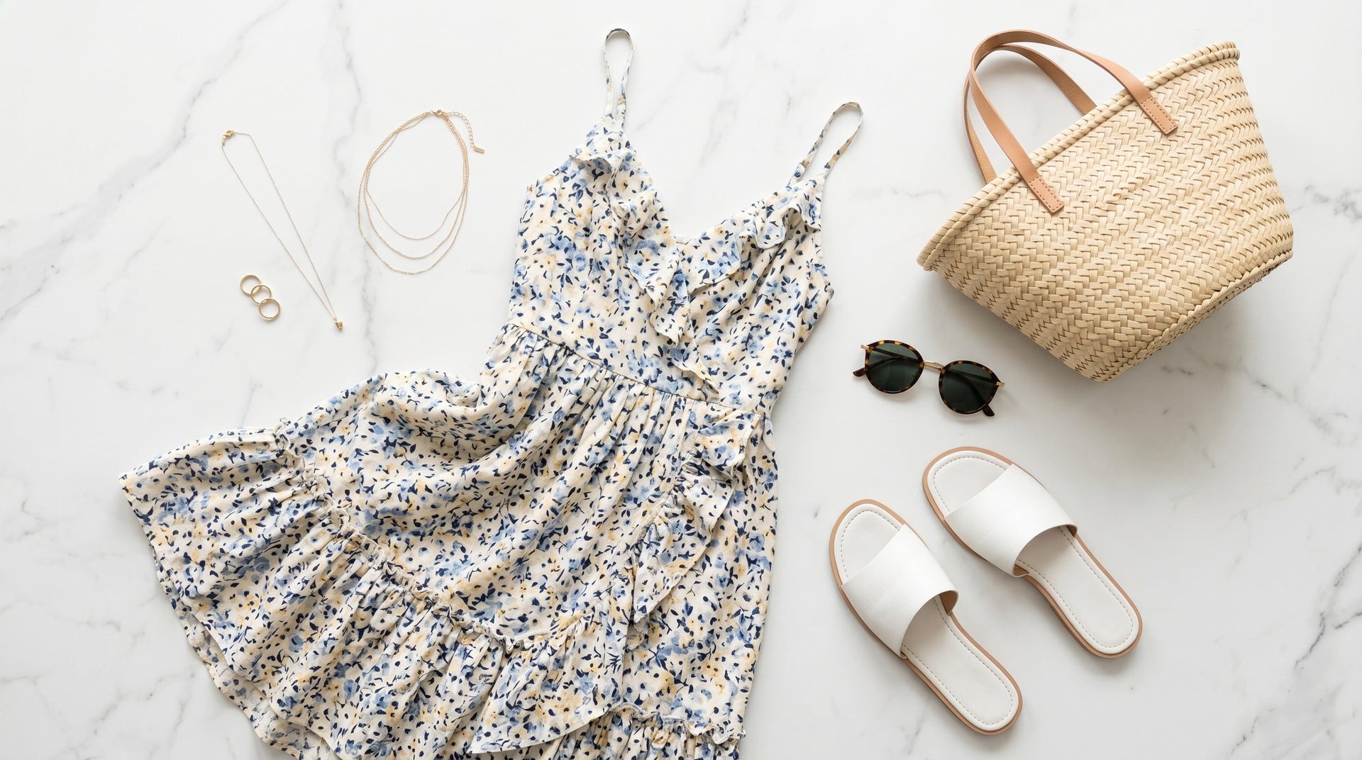 Summer outfit flat-lay with sundress sandals and accessories