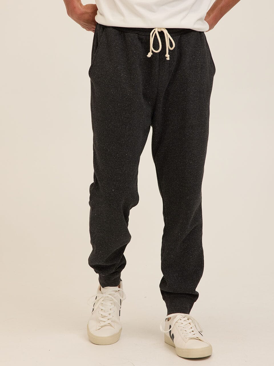 Men's Core triblend fleece joggers in charcoal and heathered grey with a modern straight-leg fit.