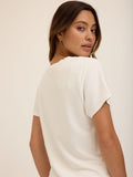 Solid off-white women's V-neck tee made from soft modal terry fabric.