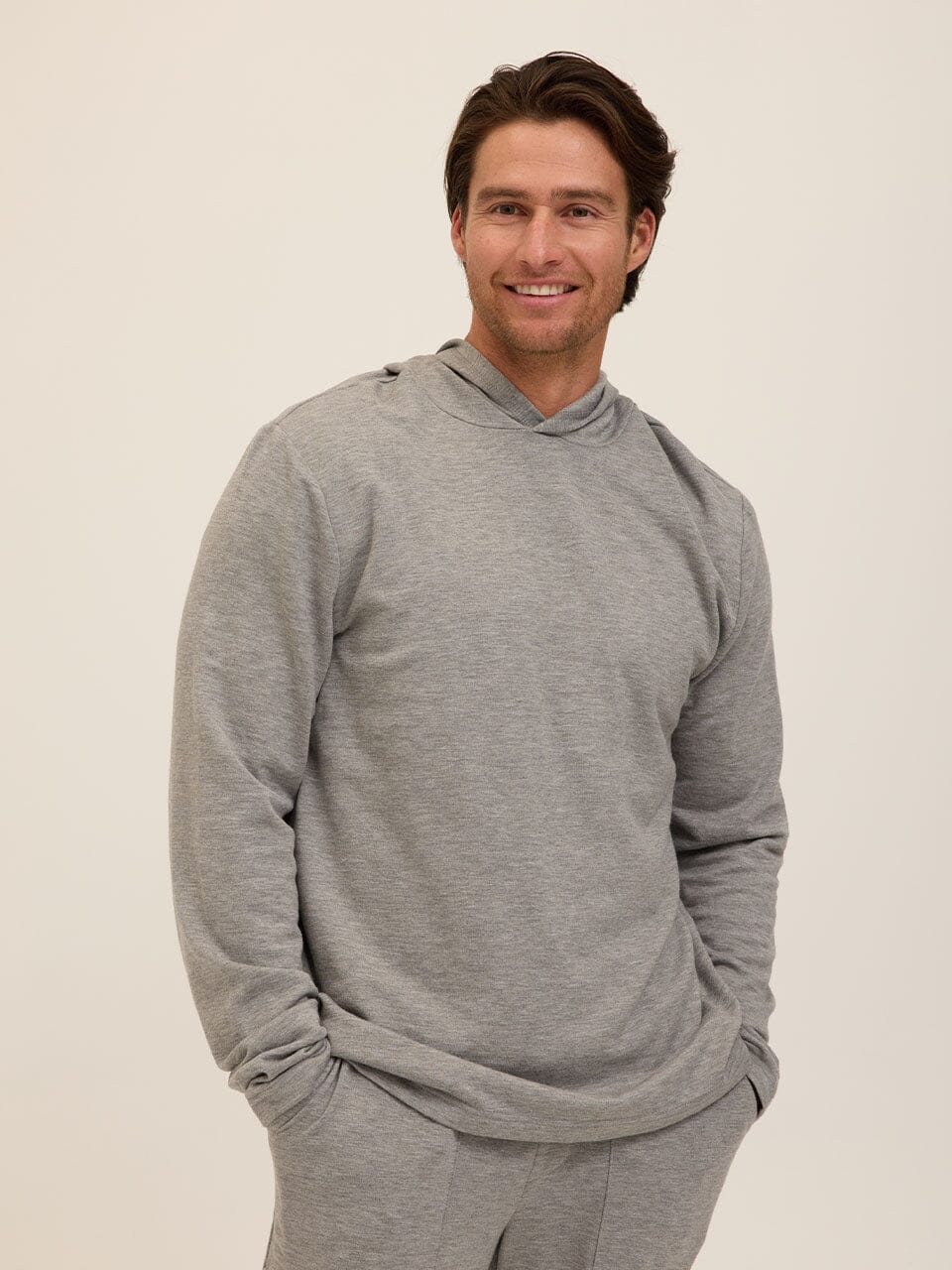 Men's Core Feather Fleece Hoodie in grey, featuring a minimalist athletic design