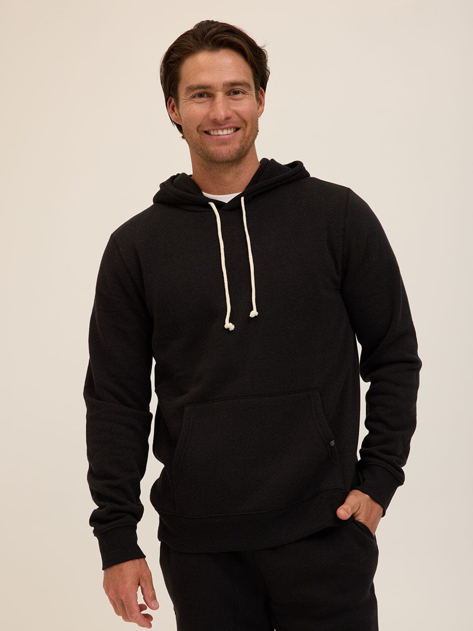 Men's Core Triblend Fleece Pullover Hoodie in a classic design with kangaroo pocket