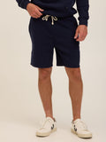 Men's relaxed fit knit triblend fleece shorts in solid deep navy blue with an adjustable drawstring waist.