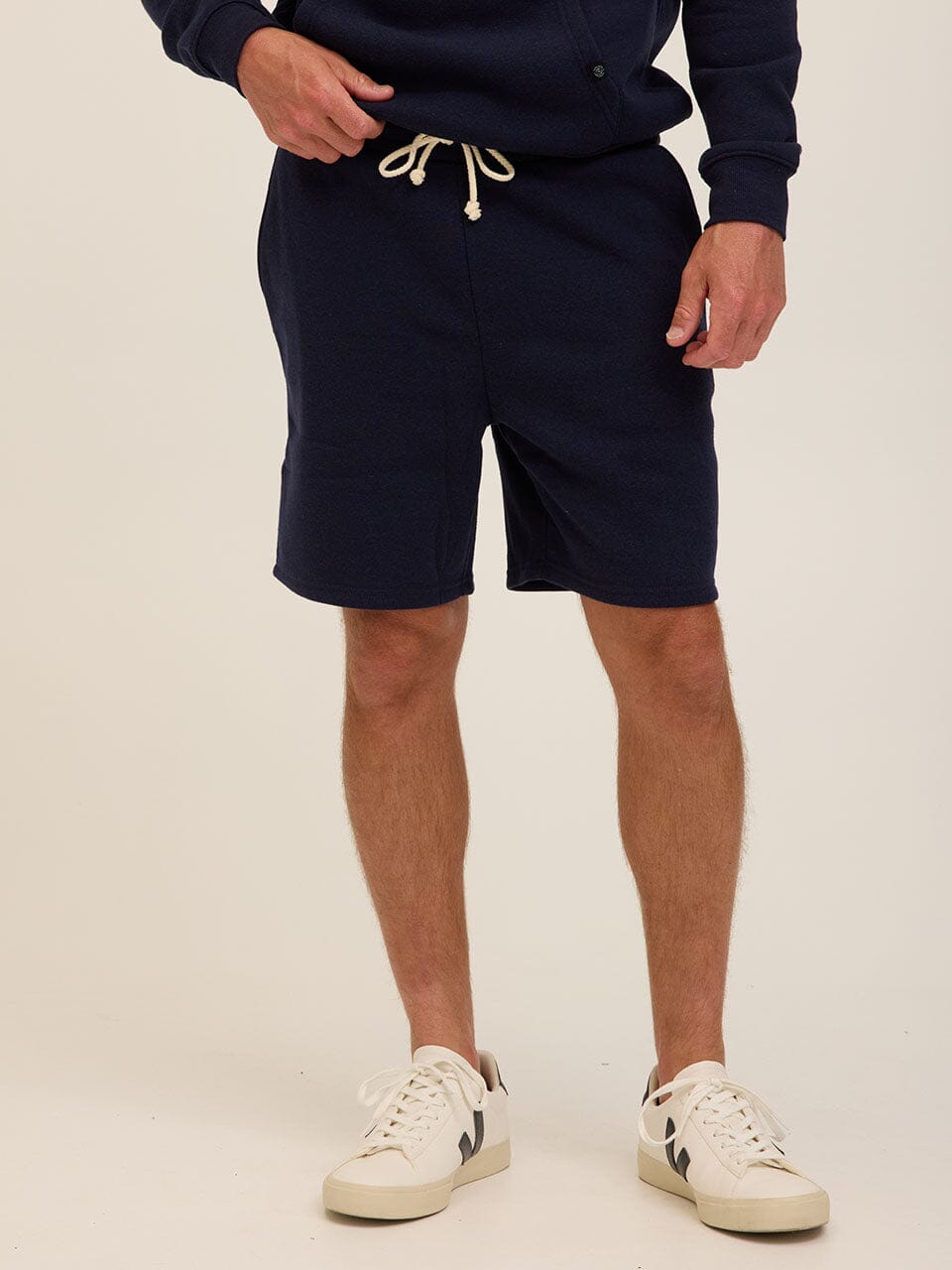 Men's relaxed fit knit triblend fleece shorts in solid deep navy blue with an adjustable drawstring waist.