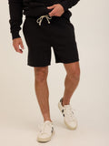 A pair of men's solid black triblend fleece shorts with an adjustable drawstring and relaxed silhouette.