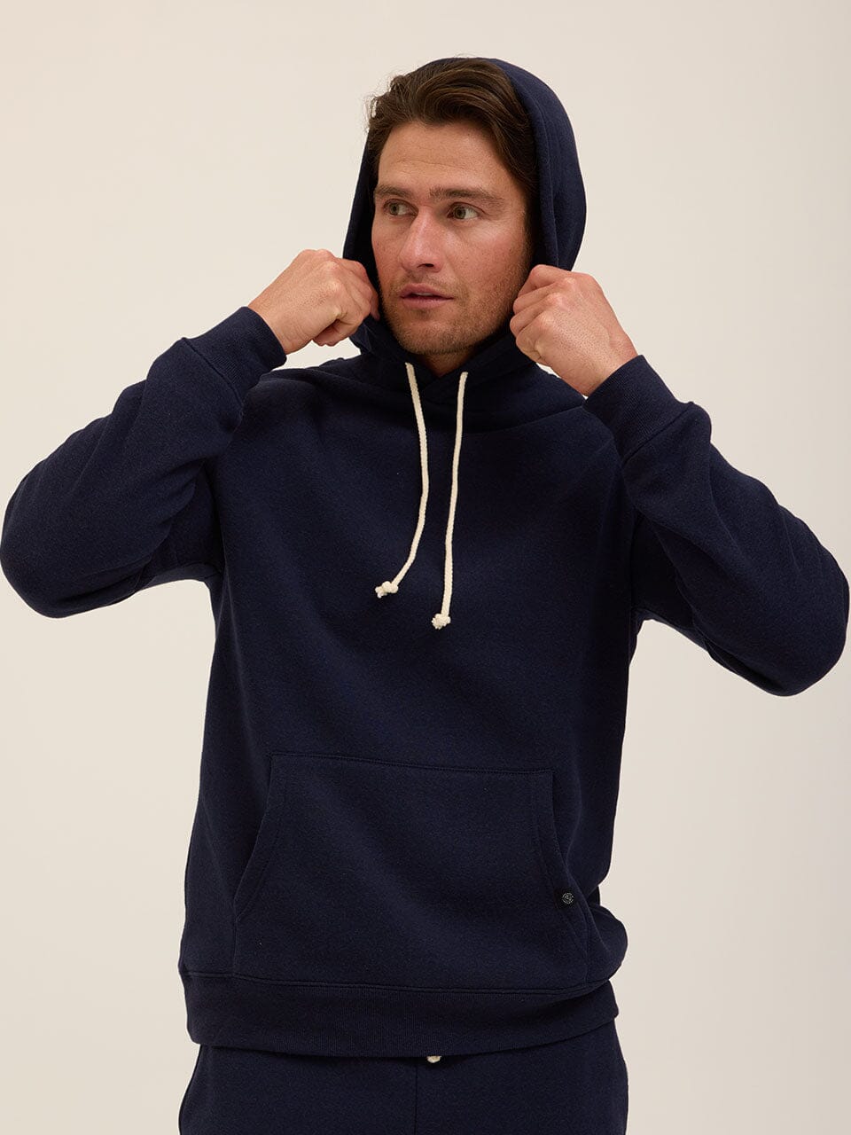 Men's Core Triblend Fleece Pullover Hoodie in a relaxed fit with kangaroo pocket and adjustable drawcord hood.
