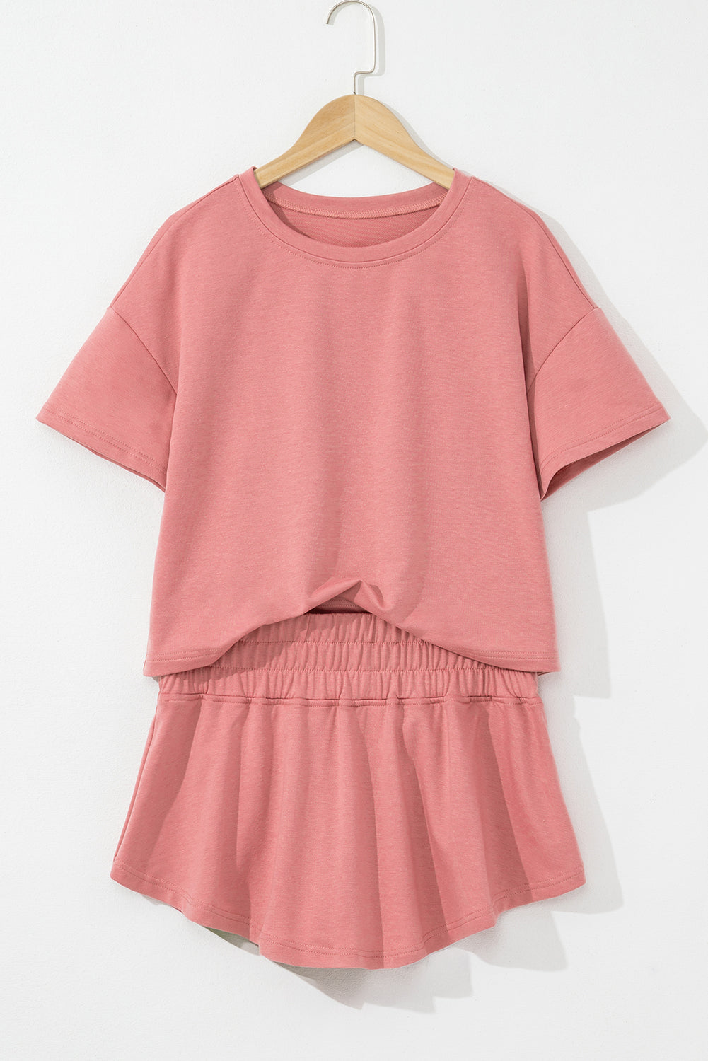 Dusty-rose 2pcs set featuring a cropped knit tee and matching ruffle skort.