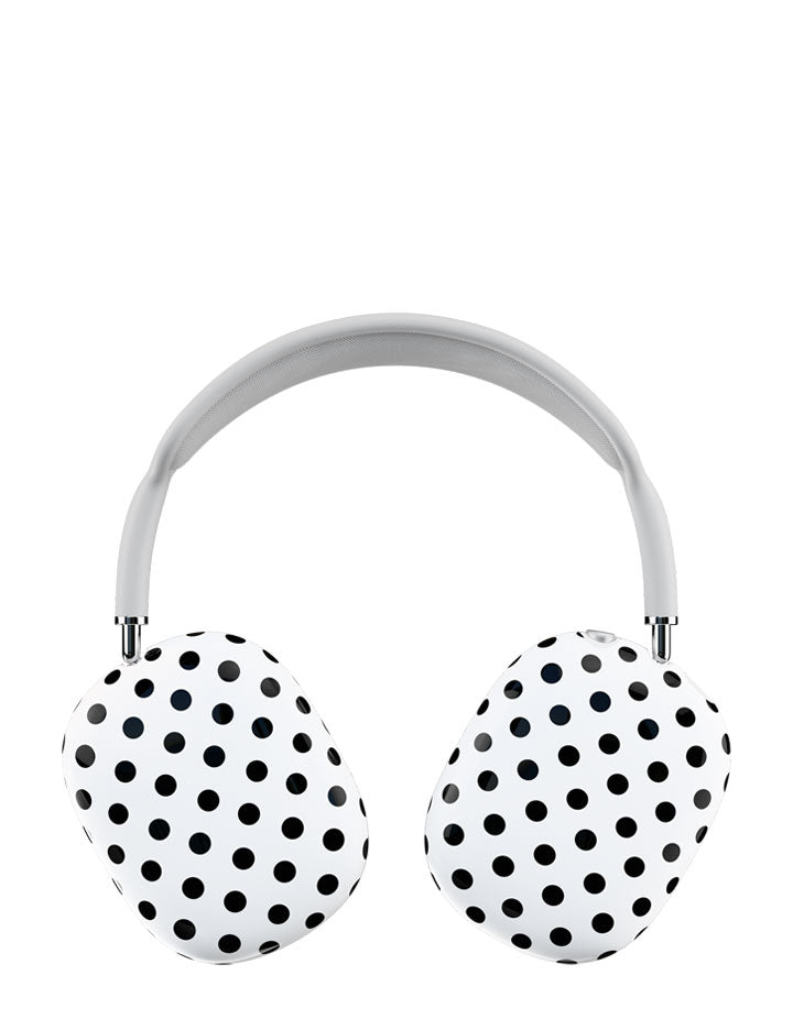 White Airpod Max headphones featuring a black polka dot protective cover.