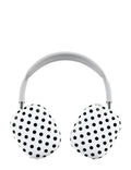White Airpod Max headphones featuring a black polka dot protective cover.