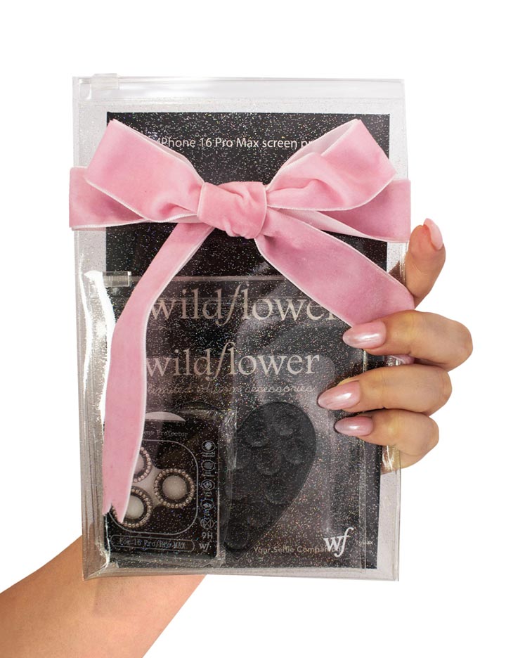 Black starter pack bundle containing a screen protector, camera bling, and heart shaped phone accessory