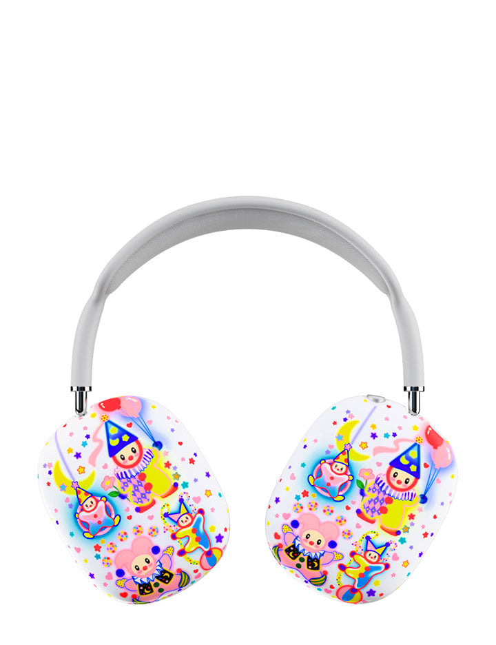 Close up of AirPods Max headphones wearing a white protective cover with a colorful clown and circus pattern.