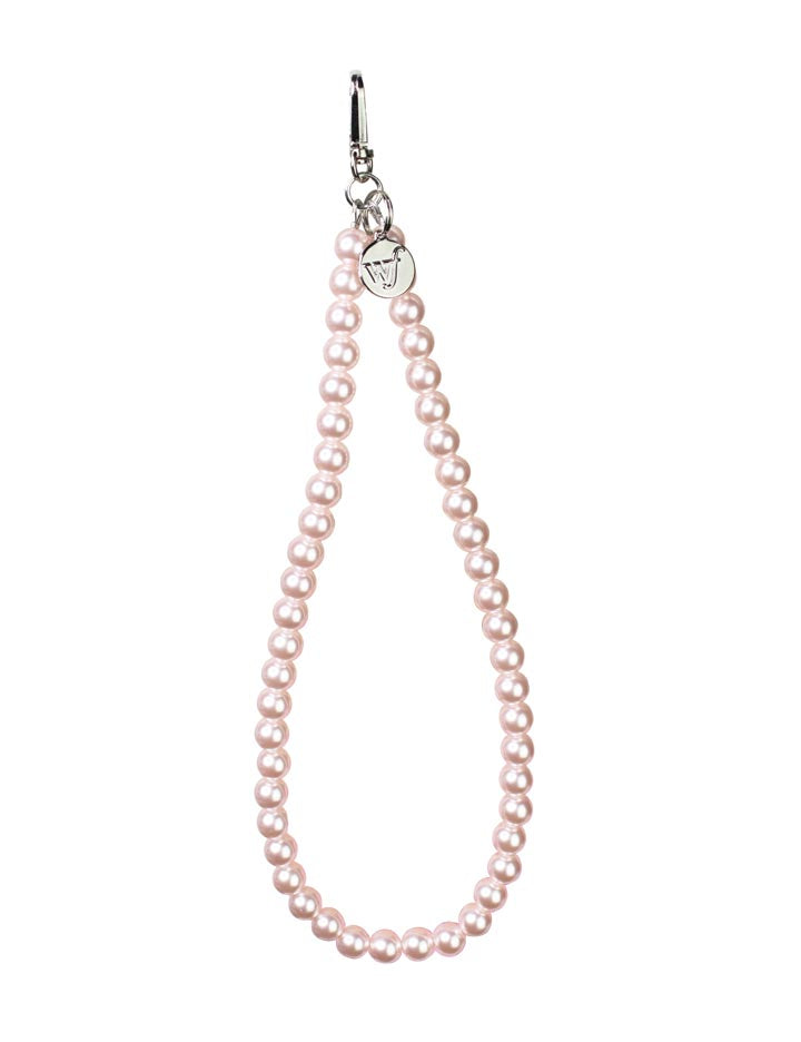 Close up of a pink pearl wristlet strap for mobile phones