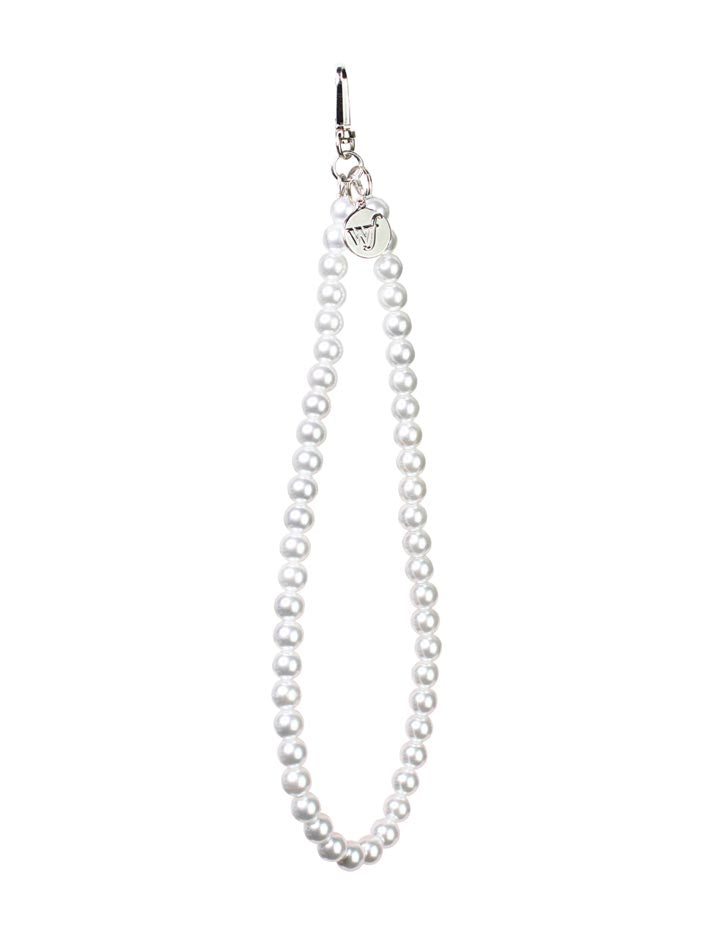 White pearl wristlet strap attached to a mobile phone case held in a hand