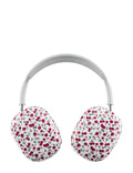Close up of AirPods Max headphones wearing a white protective cover with a red rose floral pattern.