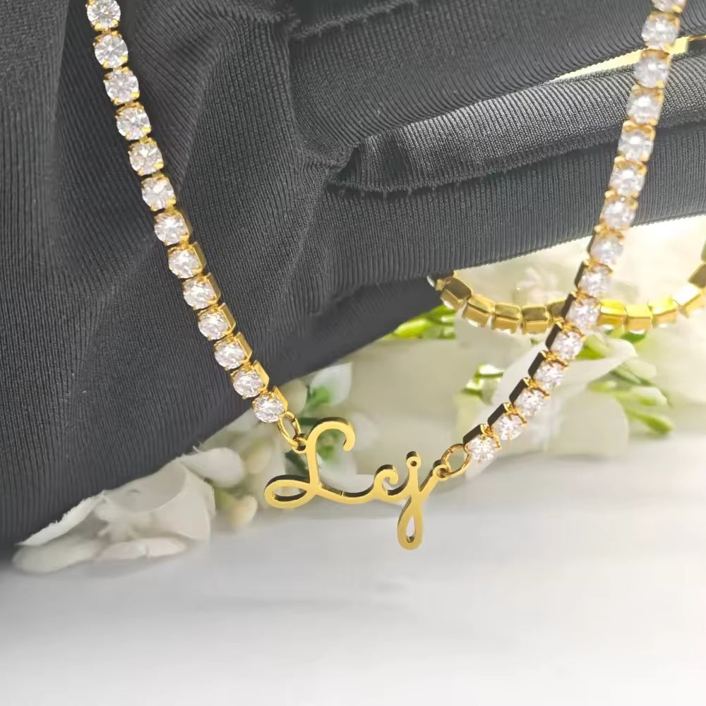 Modern letter pendant necklace in gold and white stainless steel finish