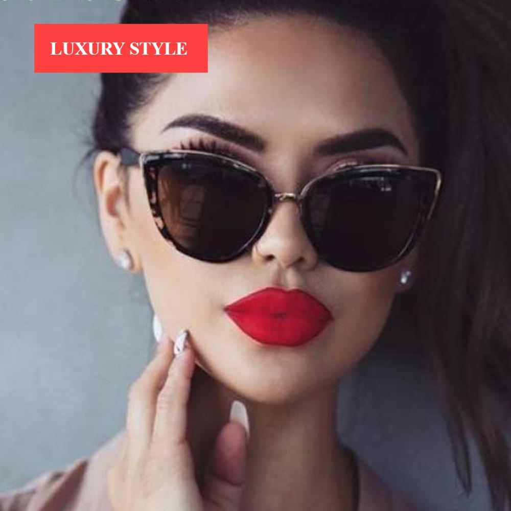 Vintage black and gold cateye sunglasses for women with UV400 protection lenses