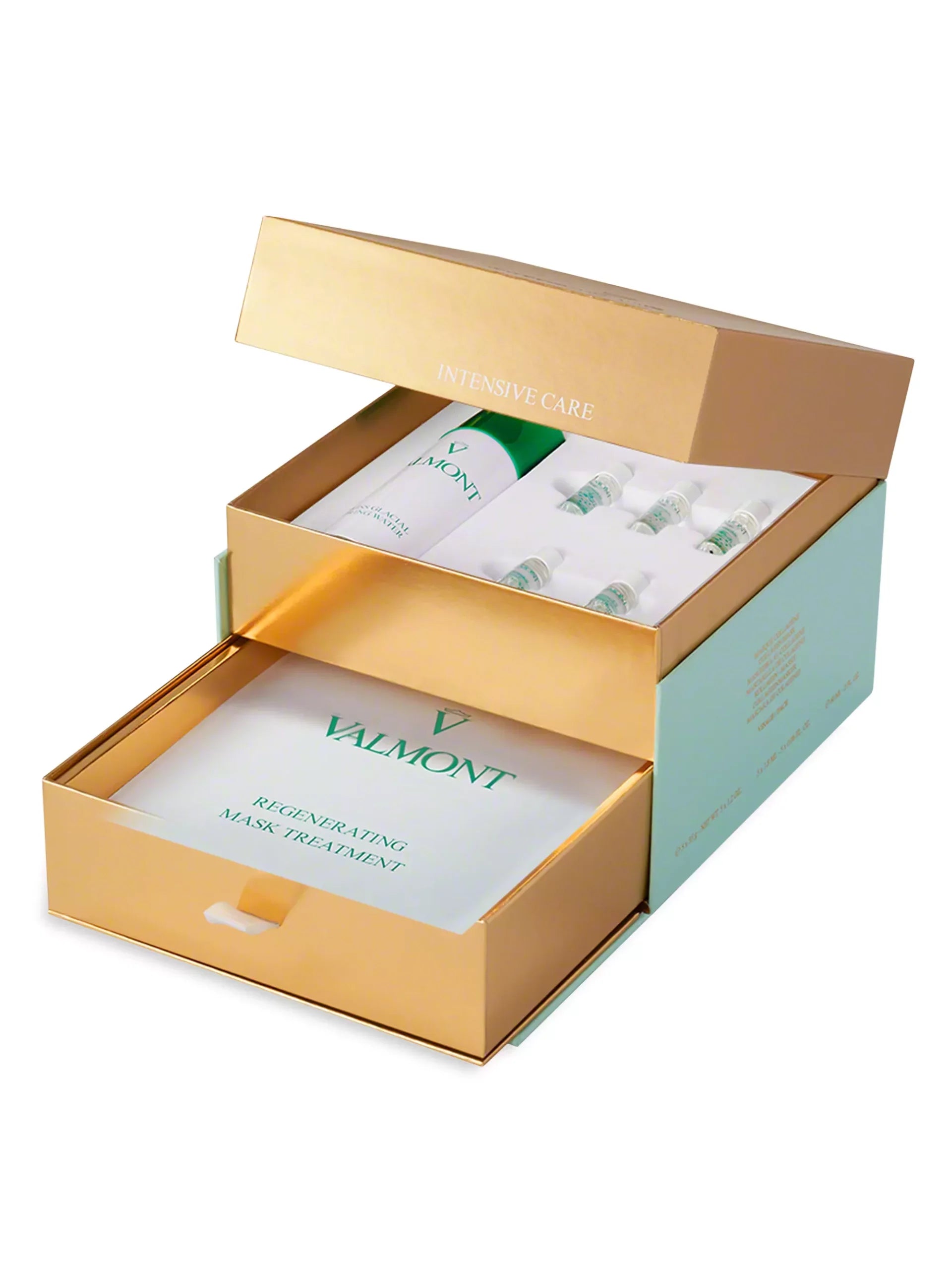 Valmont Regenerating Mask treatment set with 5 pieces in gold, white, and green packaging