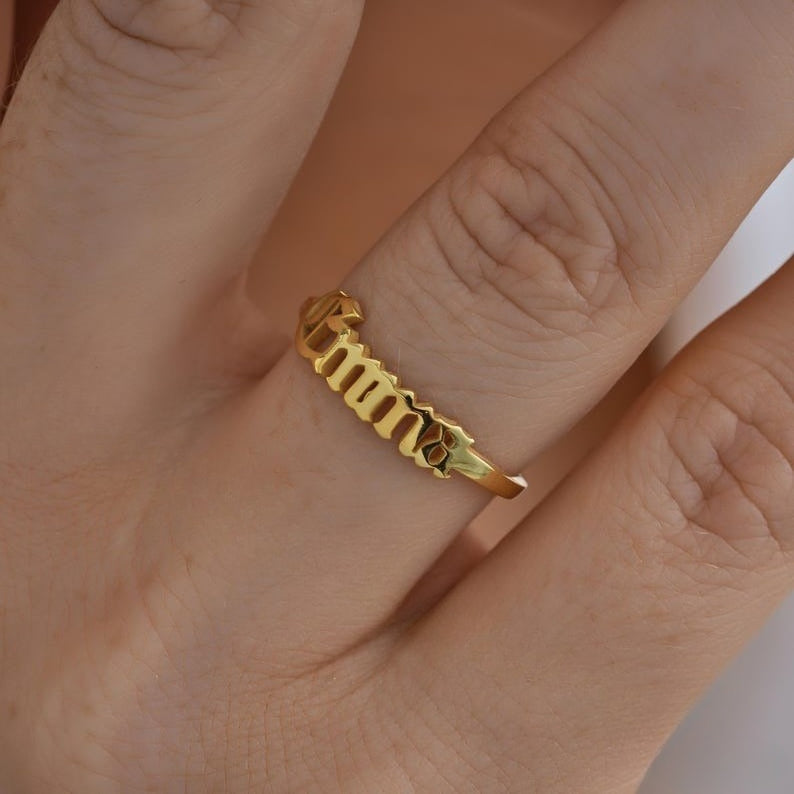 Customized Vera Lux smooth band ring with elegant name engraving