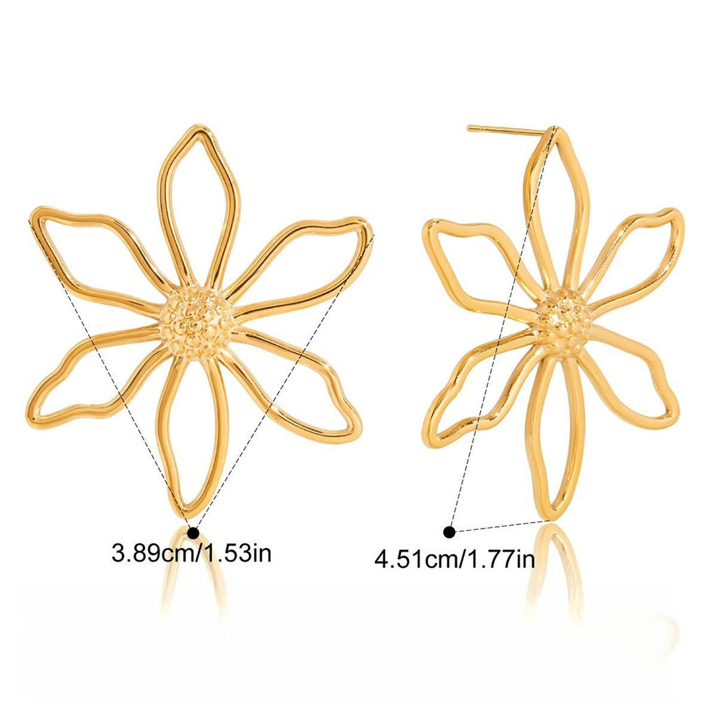 A pair of minimalist 18K gold wire flower stud earrings on a clean background.