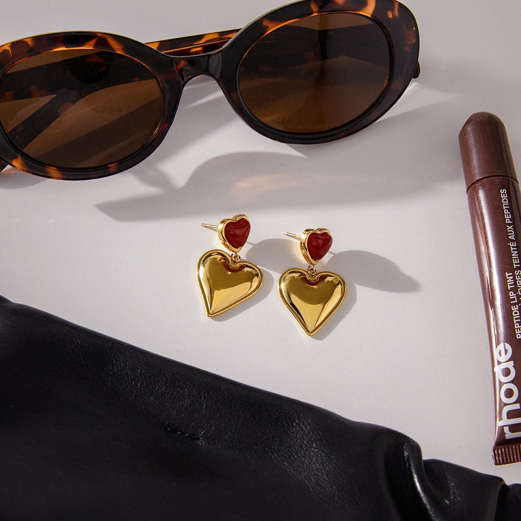 Elegant 18K gold-plated heart-shaped earrings made of durable titanium steel.