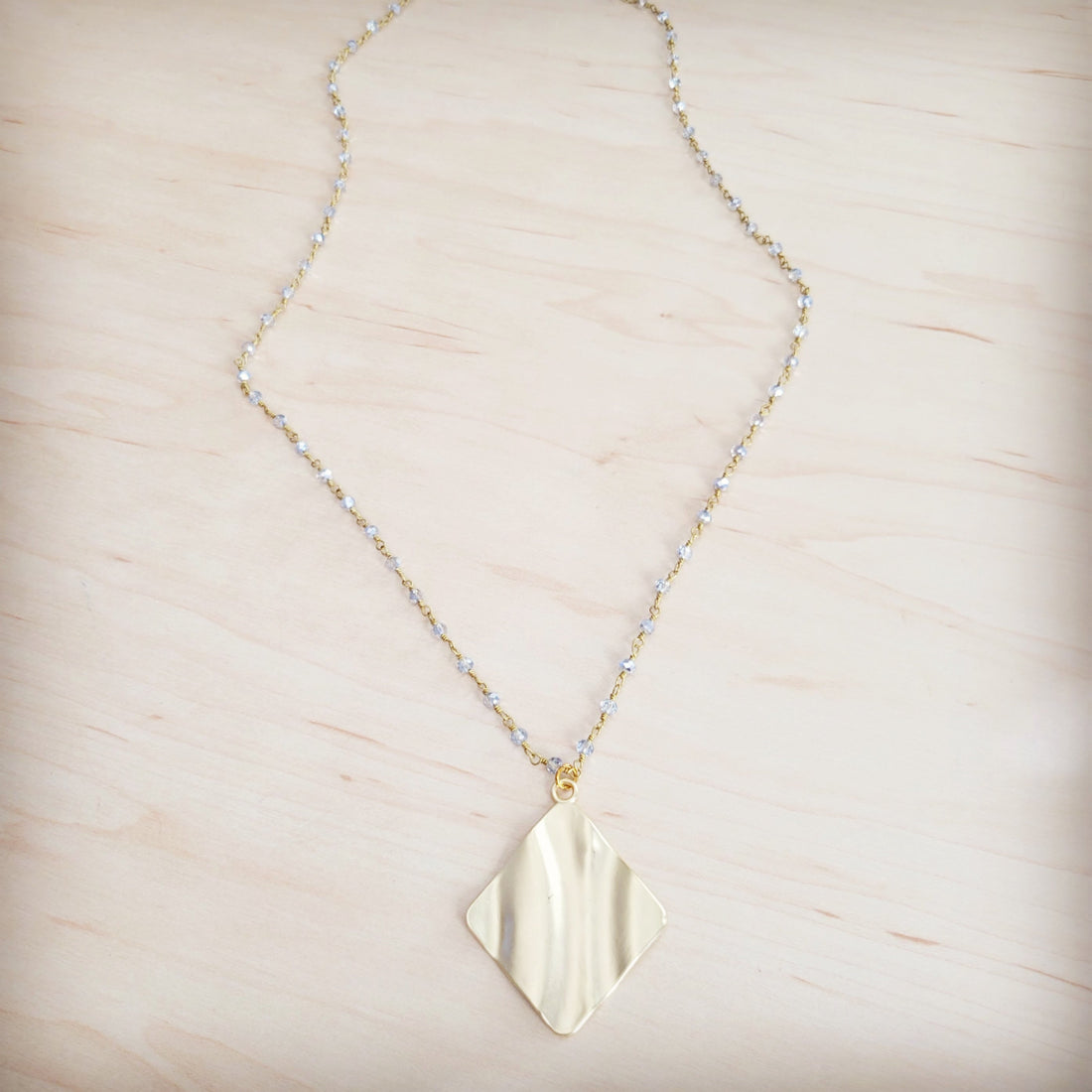 Gold-Tone Wavy Diamond Pendant Necklace with Beaded Chain - Image 3