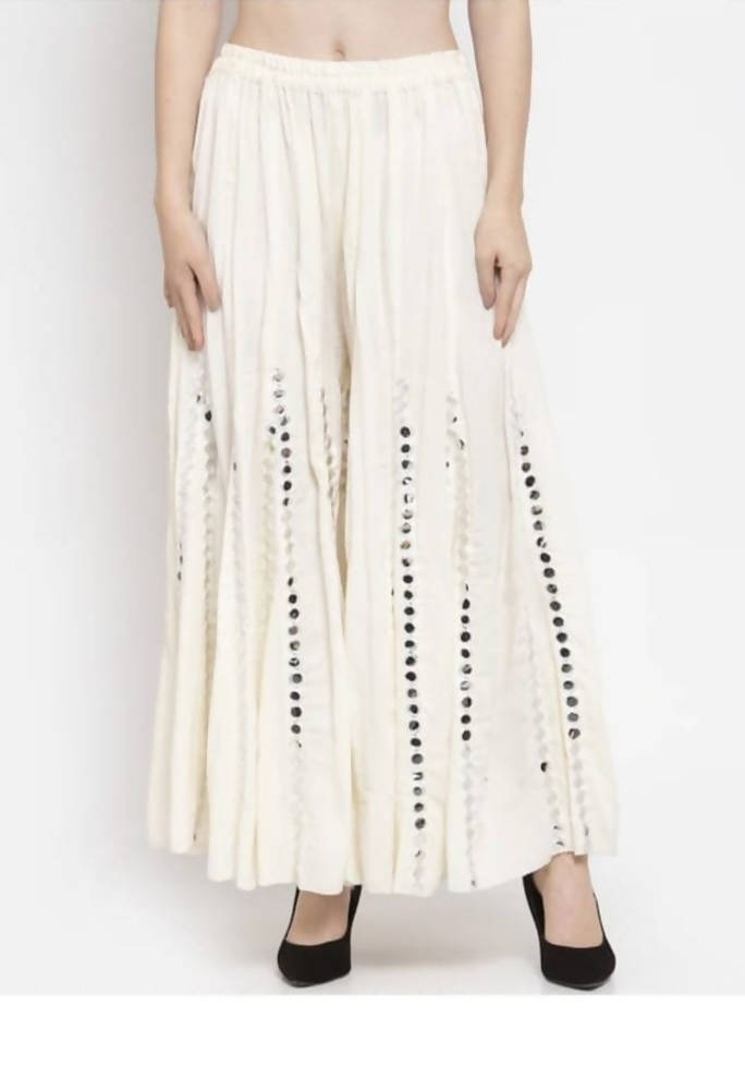White rayon cotton palazzo pants featuring intricate mirror work embellishments.