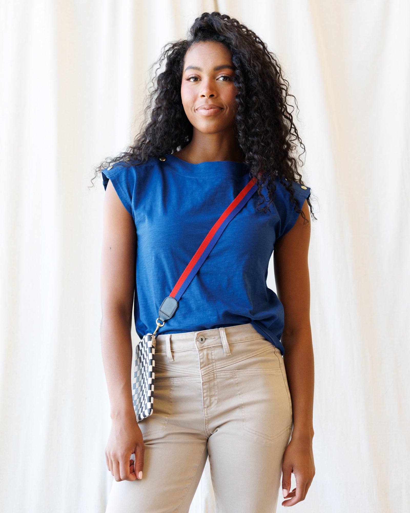 Blue Bar Harbor nautical knit top with boat neckline and gold snap shoulder detail
