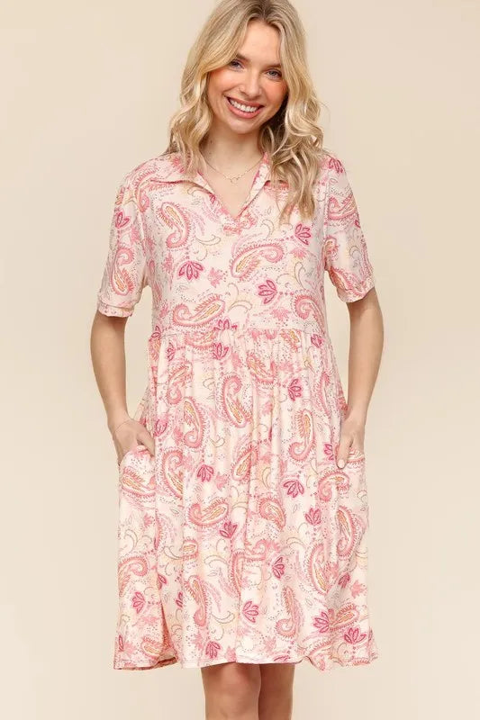 Pink and peach paisley print knit dress with a classic fit and flare design
