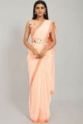 Soft peach Georgette saree featuring delicate GPO lace border and heavy Dhupiyan blouse