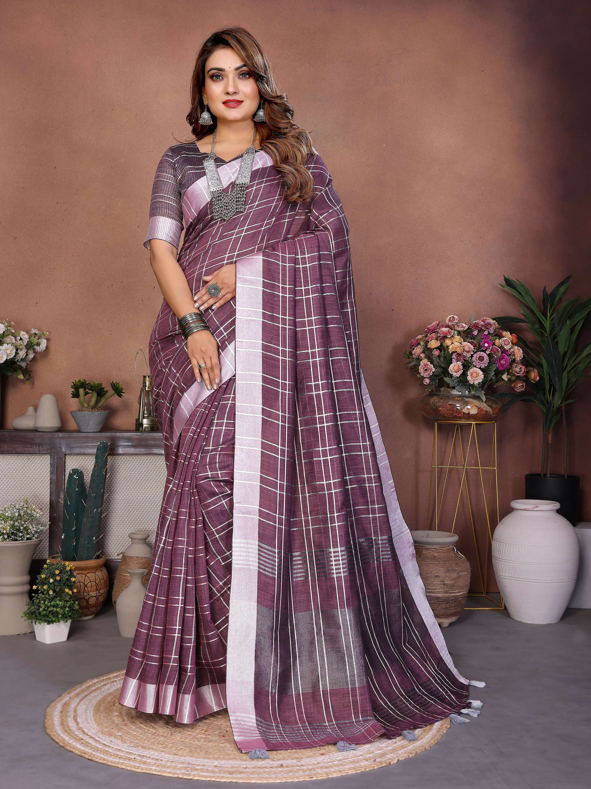 Lavender linen weaving saree displayed with elegant folds and detailed texture.