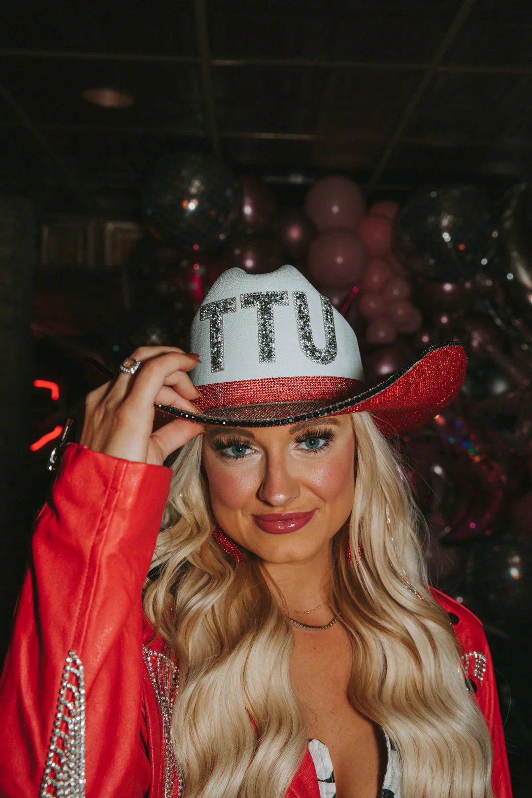 White Texas Tech University cowboy hat with red and silver accents for game day.