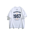 Back view of a white loose casual T-shirt featuring a large black and orange 1957 graphic print and front chest detail.