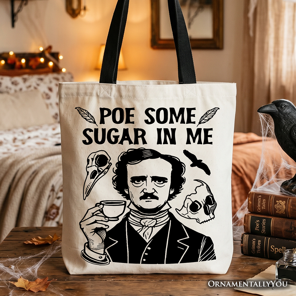 A beige canvas tote bag featuring a funny Edgar Allan Poe illustration and the text Poe Some Sugar On Me.