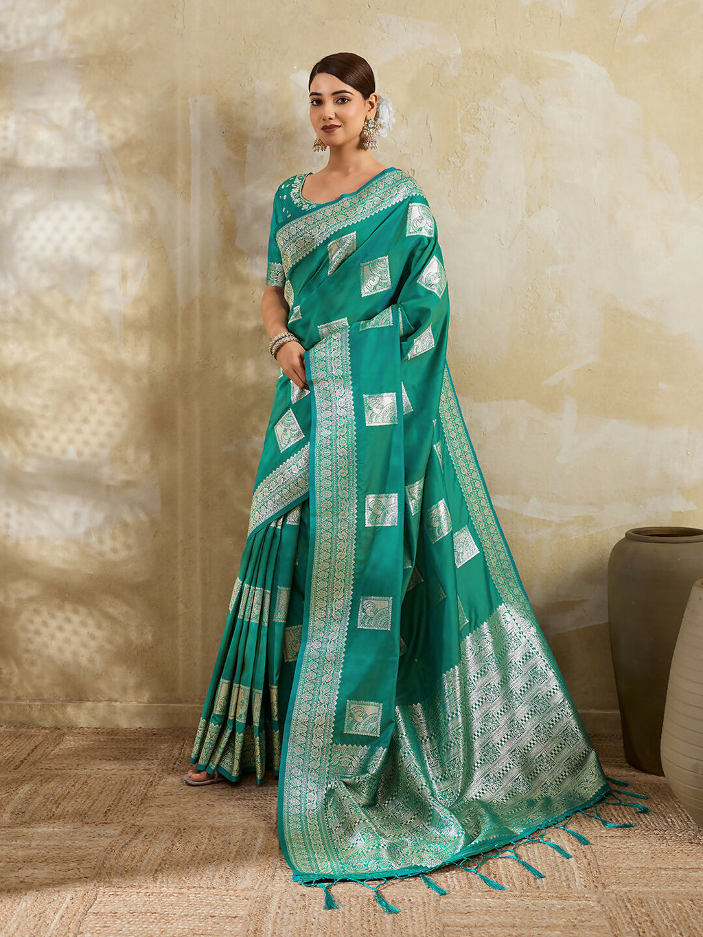 Elegant sea green silk blend saree with matching blouse piece draped beautifully