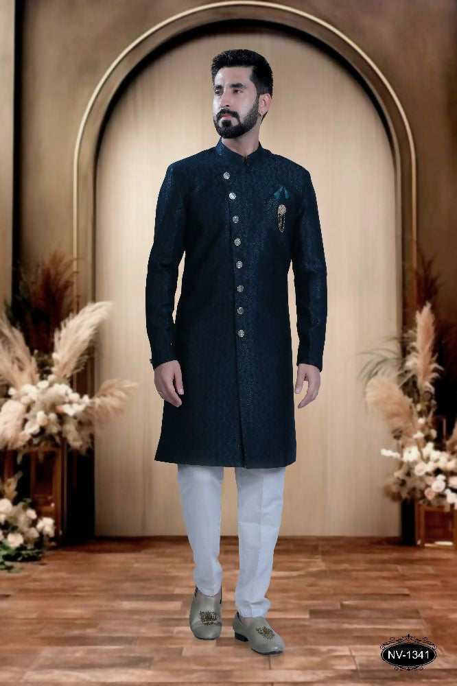 Men's Blue TR Kurta with white polo pyjama, showing self-design fabric detail.