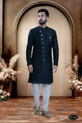 Men's Blue TR Kurta with white polo pyjama, showing self-design fabric detail.