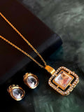 White Kundan pendant necklace and matching earring set in brass