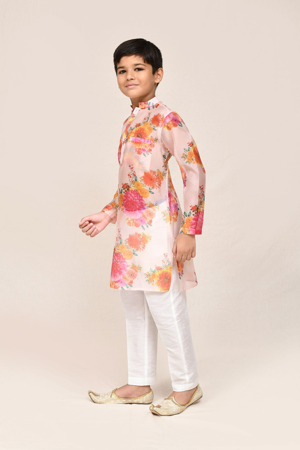 Peach Georgette kurta paired with white straight-fit pants