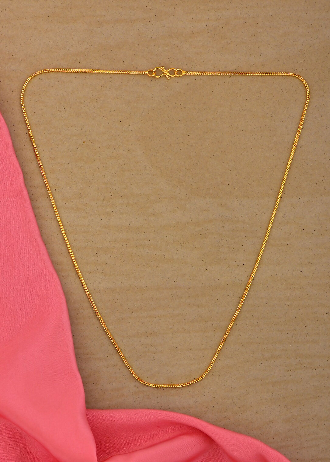 Minimalist golden brass neck-chain for women, showcasing a polished finish for an elegant look.