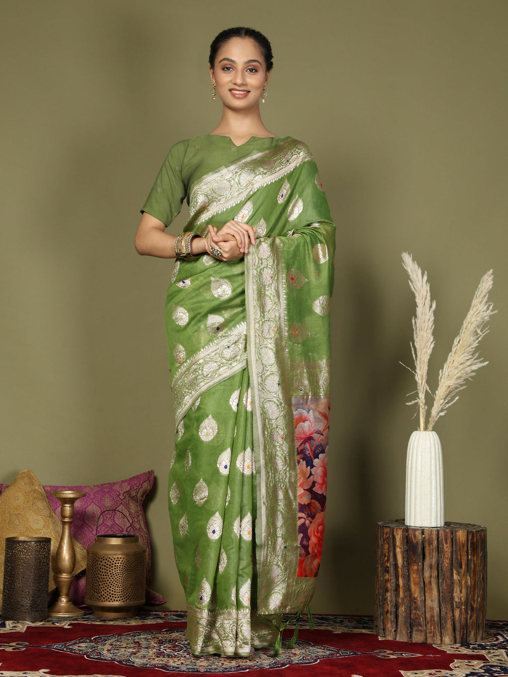 Beautiful green linen cotton saree with matching blouse draped elegantly