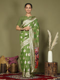 Beautiful green linen cotton saree with matching blouse draped elegantly