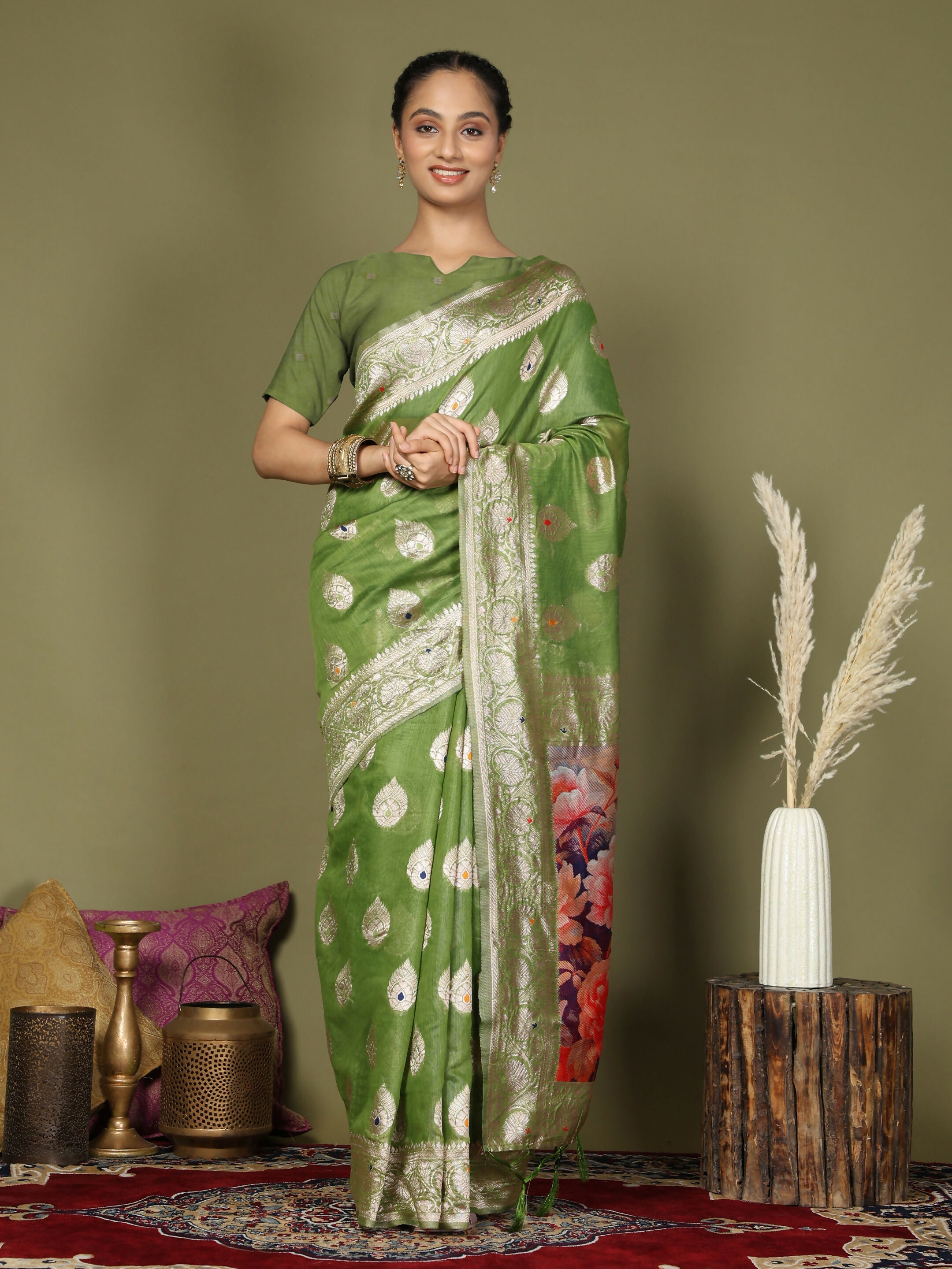 Beautiful green linen cotton saree with matching blouse draped elegantly
