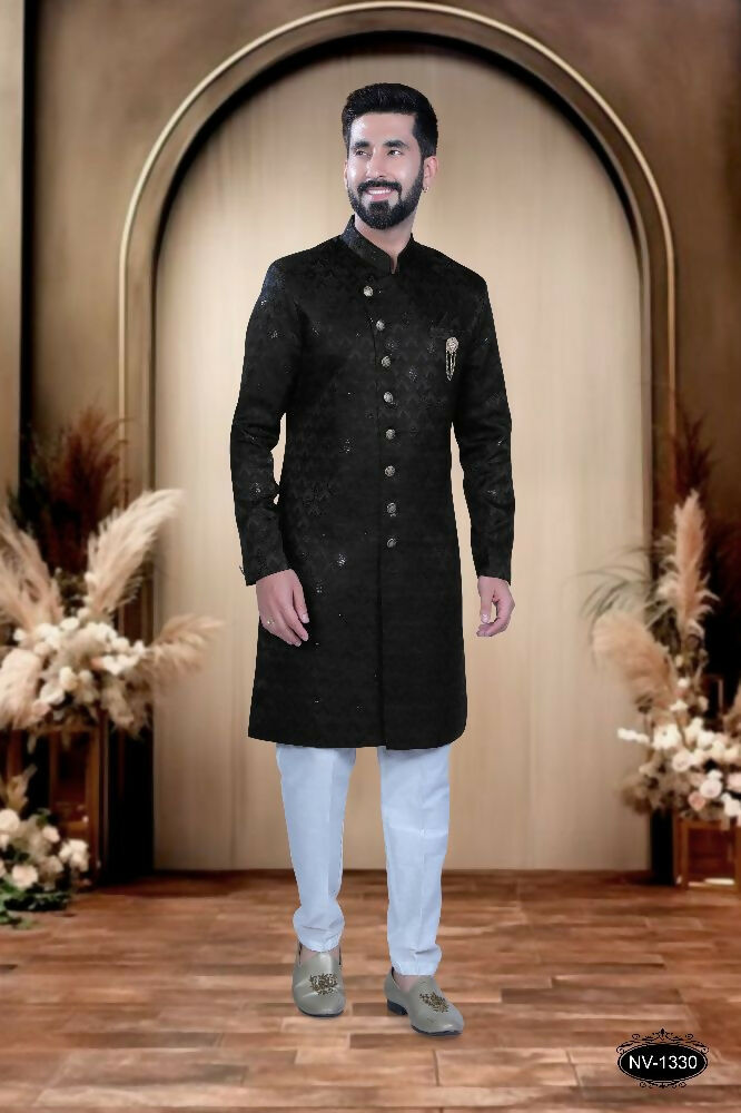 A black self-design TR fabric Kurta with matching polo-style pyjama for boys