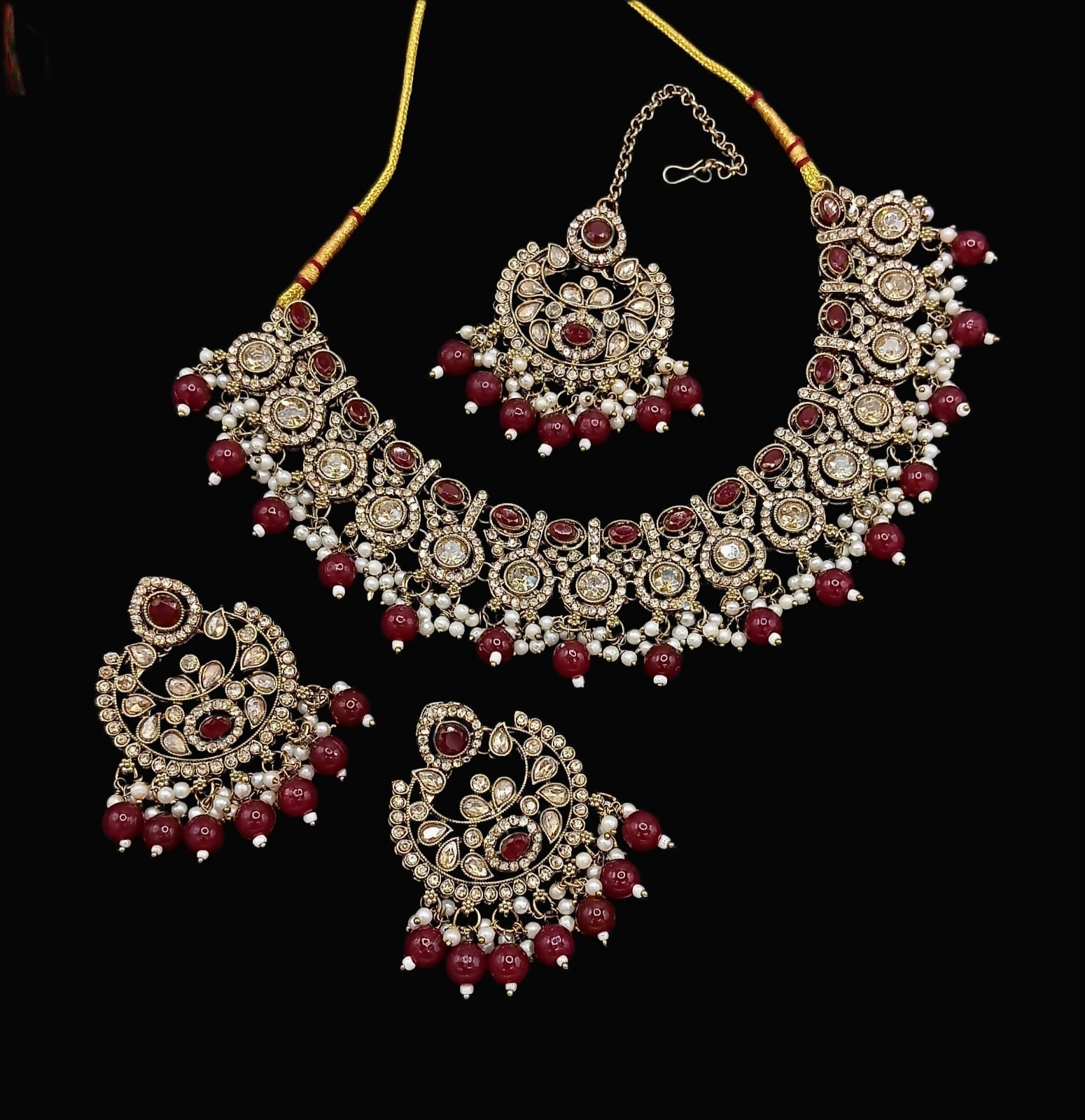 Maroon stone work necklace set with matching earrings for traditional wear