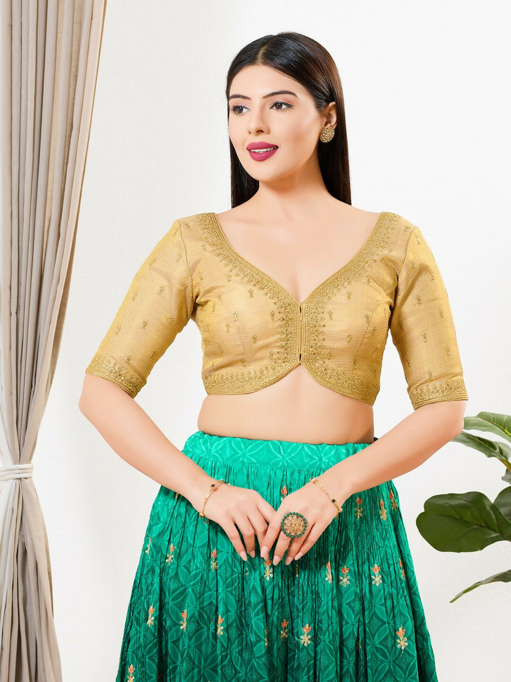 Gold tissue padded blouse with sweetheart neck and elbow sleeves