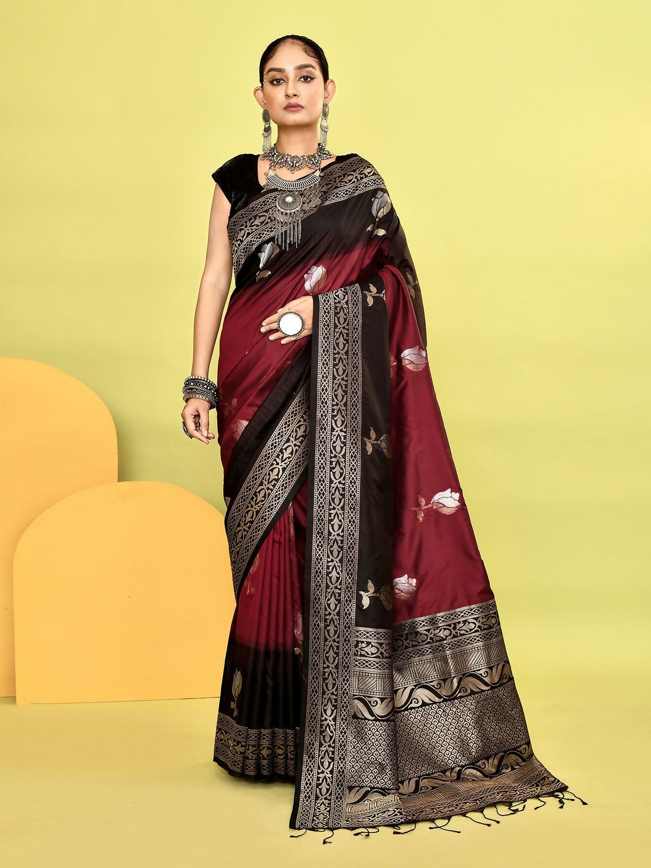 Maroon and black Banarasi silk saree with a traditional weaving border and unstitched blouse