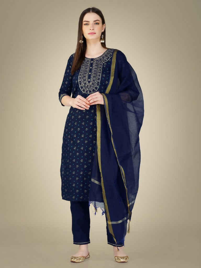 Model wearing a navy blue straight kurta set with sequence and embroidery details.