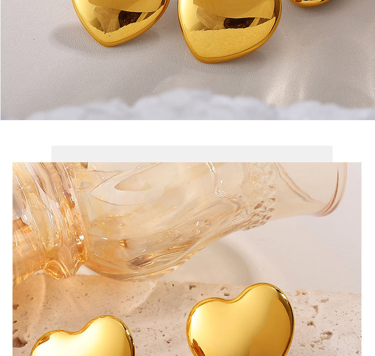 European And American Minimalist Glossy Heart-shaped Stainless Steel Earrings For Women. Light Luxury Minimalist Style. Exaggerated Heart-shaped Earrings. Versatile Accessories.