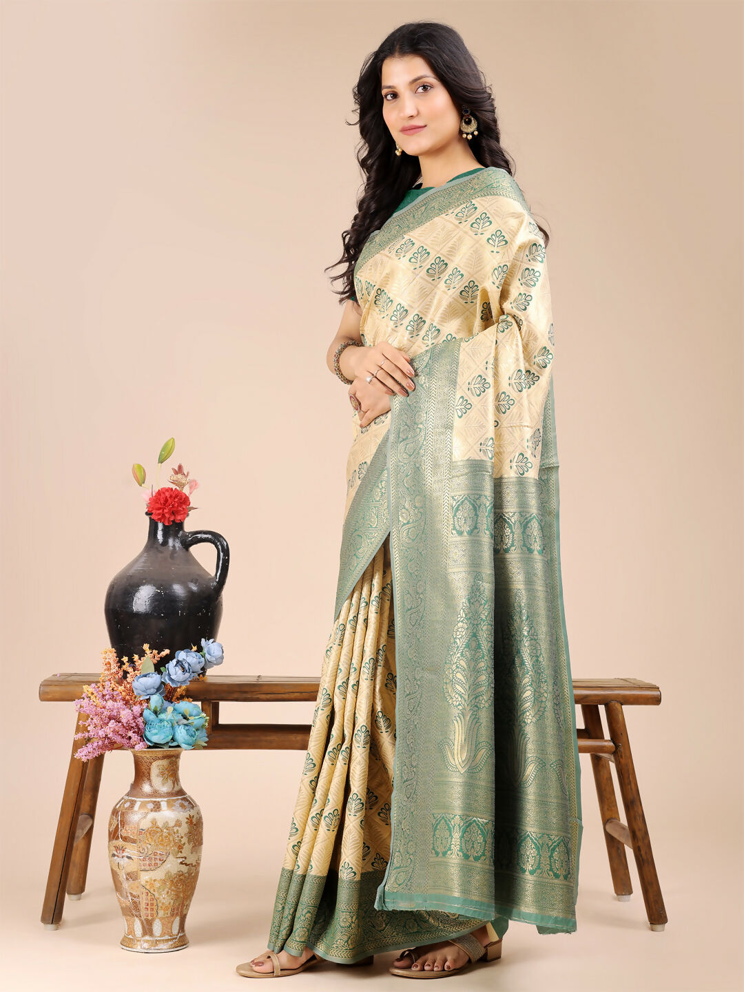 Cream and Green Aura Silk Banarasi Saree with Matching Blouse