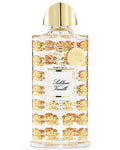 Sublime Vanille Eau De Parfum 2.5 oz in a clear glass bottle with a luxurious gold cap and decorative gold accents.