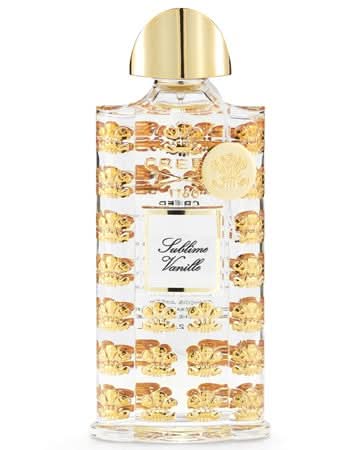 Sublime Vanille Eau De Parfum 2.5 oz in a clear glass bottle with a luxurious gold cap and decorative gold accents.